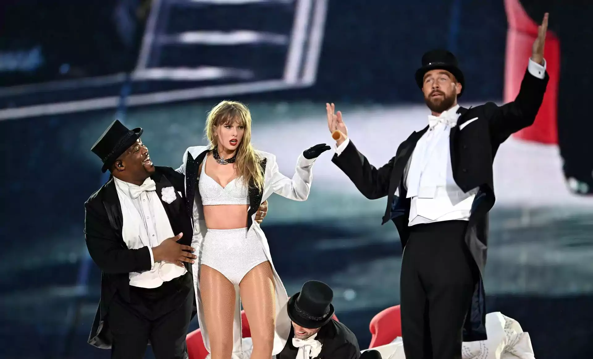 Travis Kelce Joins Taylor Swift Onstage, Sending Fans Into A Frenzy