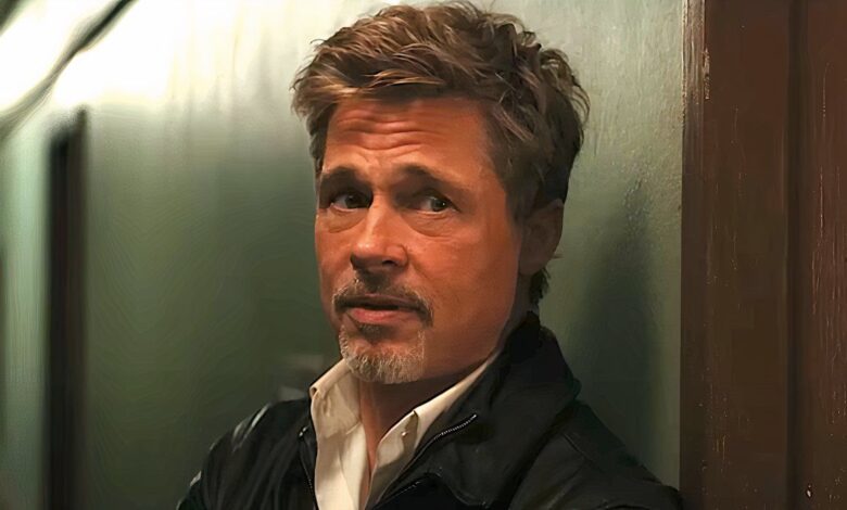 brad pitt s character looks concerned in wolfs trailer 2024