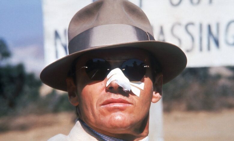 jack nicholson with bandages over his nose in chinatown